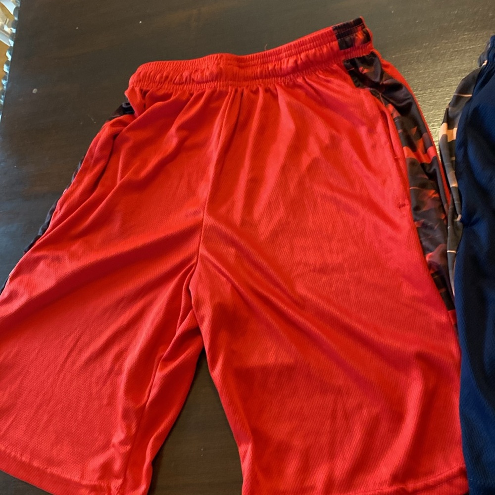 $15 -4 pairs of Boys large shorts. Several brands.